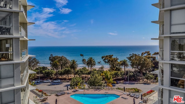 view of water feature with a beach view