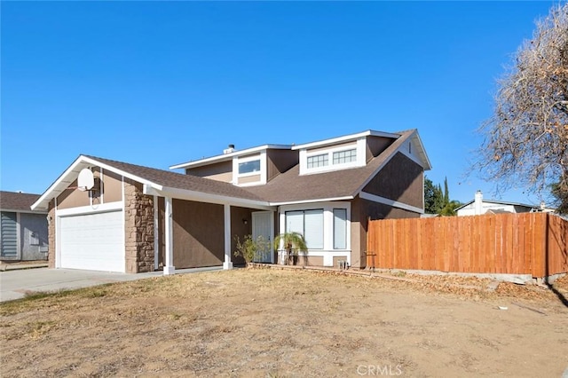 view of front of property featuring a garage