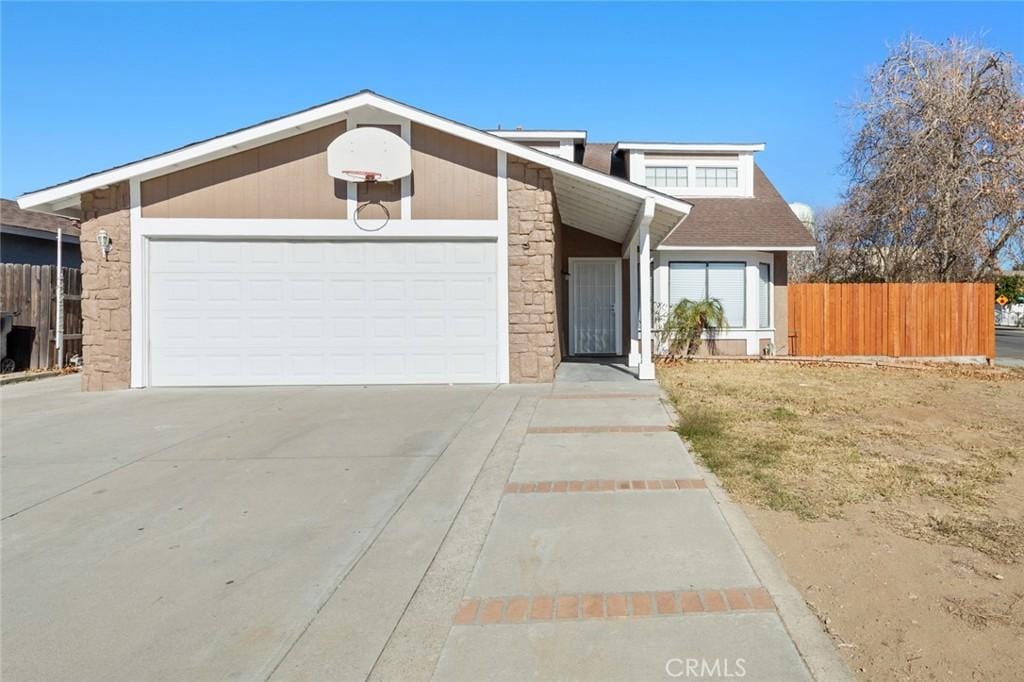 view of front of property featuring a garage