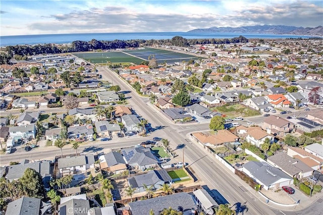 bird's eye view with a residential view and a water view