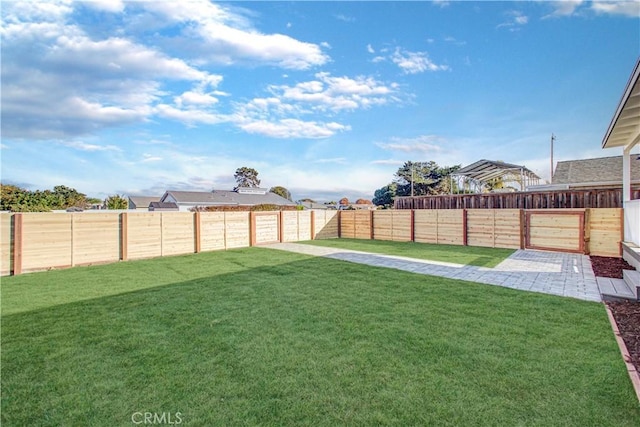 view of yard featuring a fenced backyard