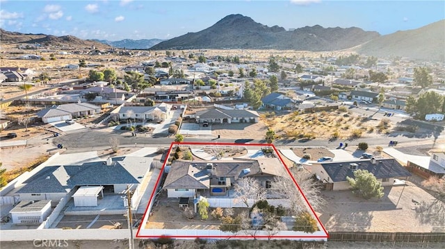 drone / aerial view featuring a mountain view