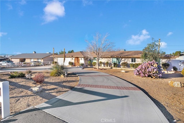 ranch-style house featuring a garage