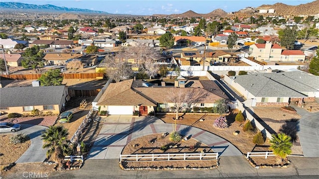 drone / aerial view featuring a mountain view