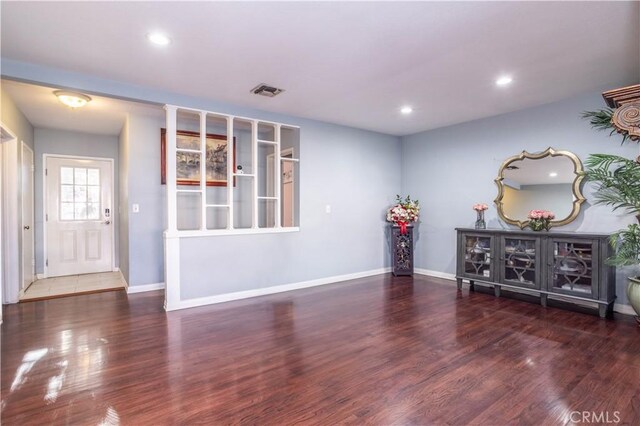 interior space with dark hardwood / wood-style floors