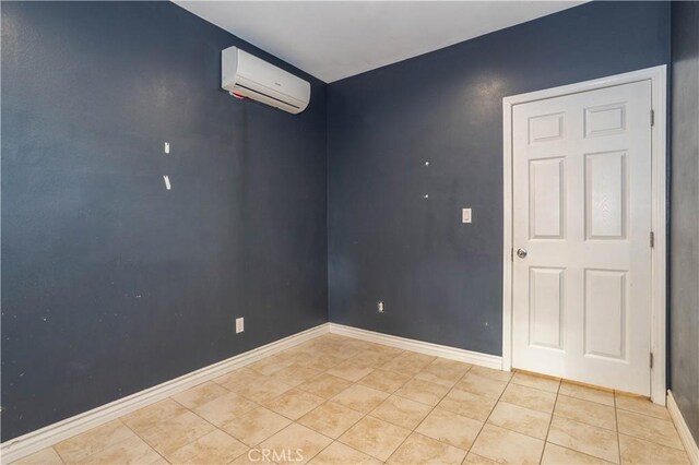 tiled empty room with a wall unit AC