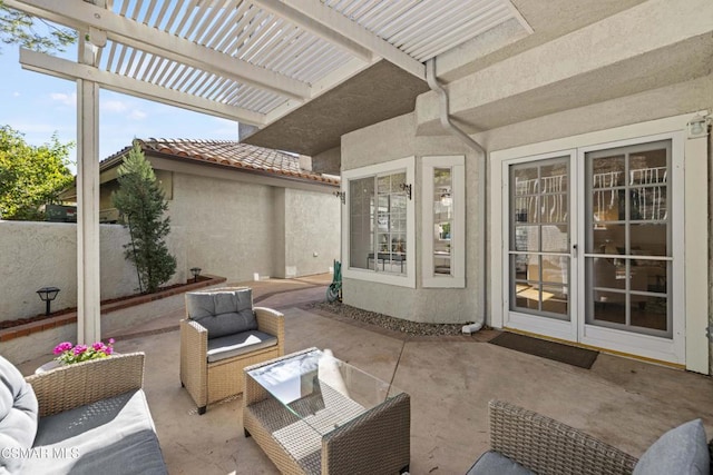 view of patio with a pergola and outdoor lounge area