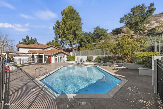 view of pool with a patio