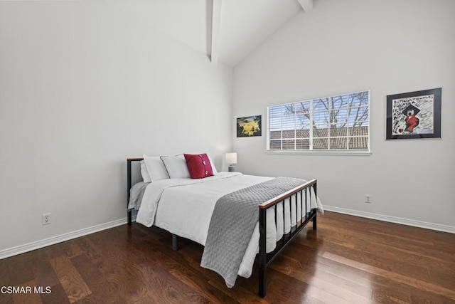 bedroom with beamed ceiling, dark hardwood / wood-style floors, and high vaulted ceiling