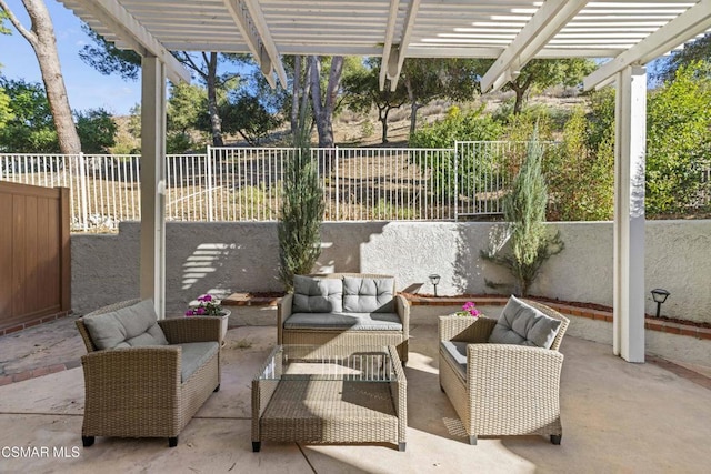 view of patio / terrace with an outdoor hangout area and a pergola