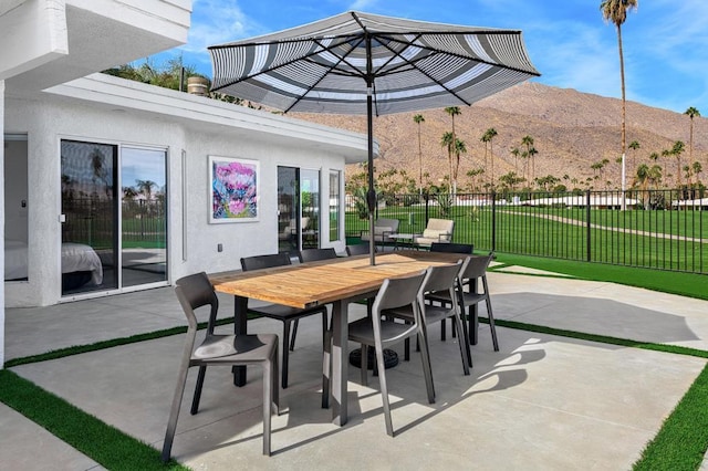 view of patio / terrace featuring a mountain view