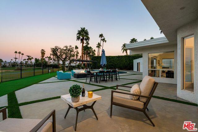 patio terrace at dusk with an outdoor living space