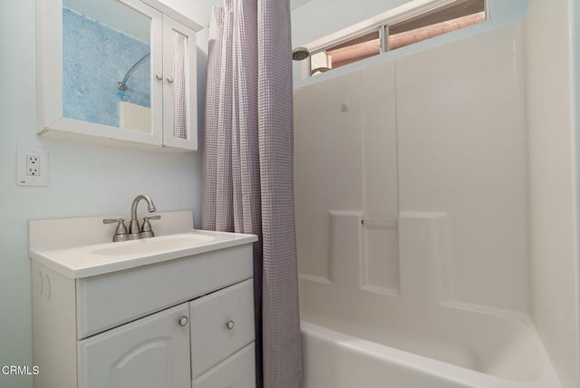 bathroom with vanity and shower / bath combo