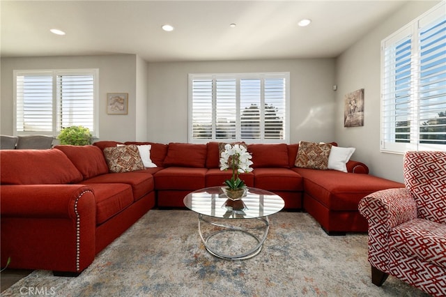 living room with a healthy amount of sunlight and recessed lighting