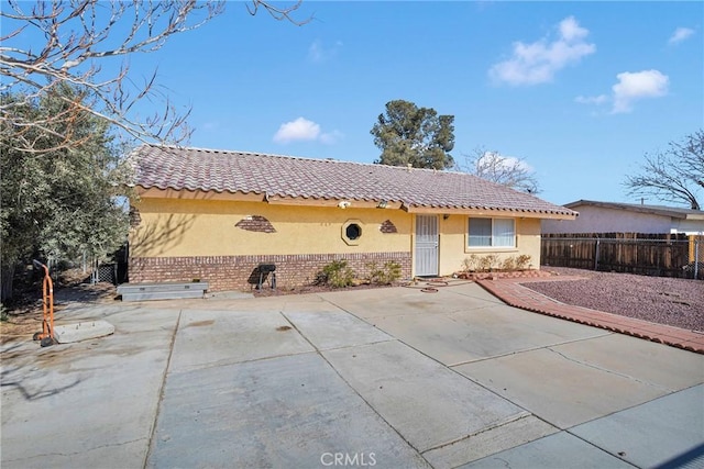 back of house featuring a patio area