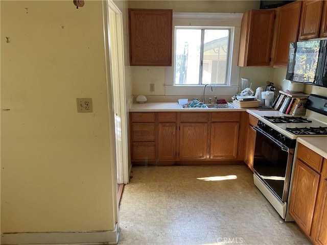 kitchen with gas stove and sink