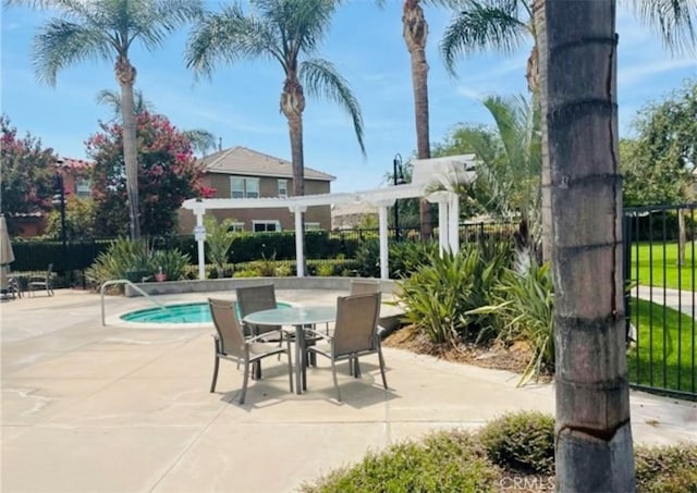 view of swimming pool featuring a pergola and a patio