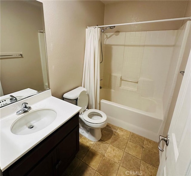 full bathroom featuring shower / bathtub combination with curtain, vanity, tile patterned flooring, and toilet