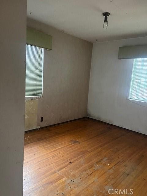 unfurnished room featuring light hardwood / wood-style flooring