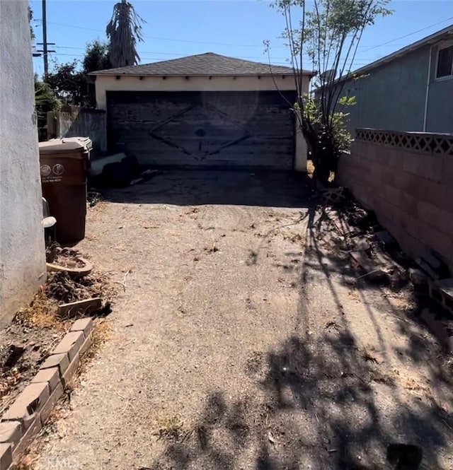 view of yard with a garage