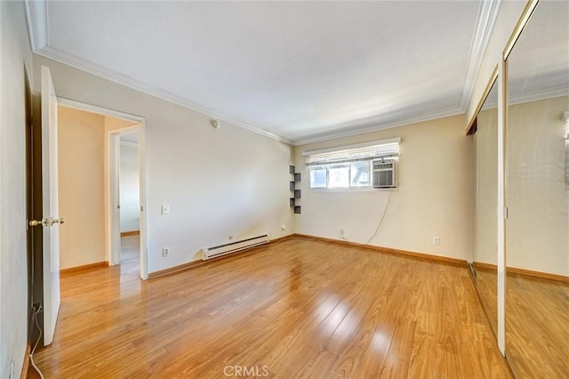 396 S Miraleste Dr Unit 512, San Pedro, CA 90732 - empty room with baseboards, ornamental molding, baseboard heating, and wood finished floors