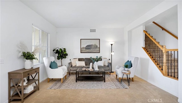 living room with light colored carpet