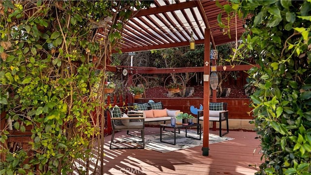 wooden deck with outdoor lounge area and a pergola