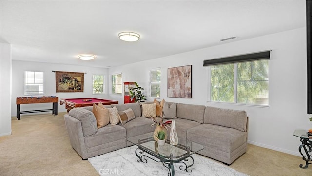 living room featuring light colored carpet, a wealth of natural light, billiards, and visible vents
