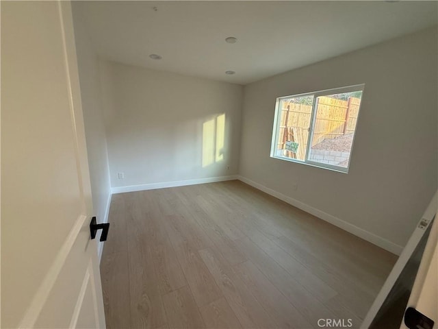 empty room featuring light hardwood / wood-style flooring