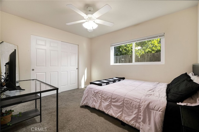 bedroom featuring carpet flooring, ceiling fan, and a closet