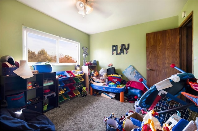 carpeted bedroom featuring ceiling fan