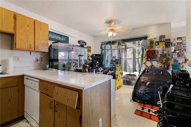 kitchen with white dishwasher, ceiling fan, and kitchen peninsula