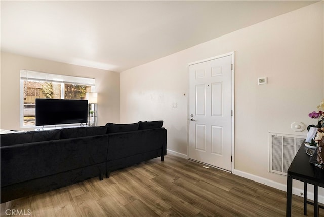 living room with hardwood / wood-style flooring