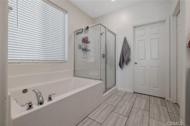 bathroom with independent shower and bath