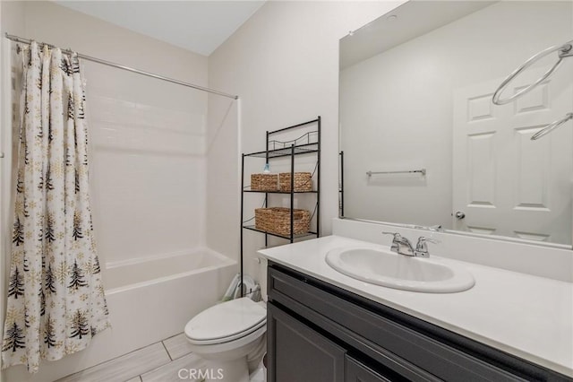 full bathroom featuring vanity, toilet, and shower / bath combo with shower curtain