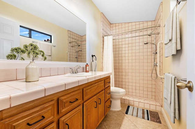 bathroom featuring tile patterned floors, toilet, vanity, and a shower with curtain