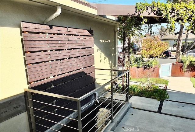 property entrance featuring a patio area