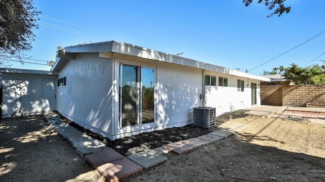 exterior space featuring central air condition unit