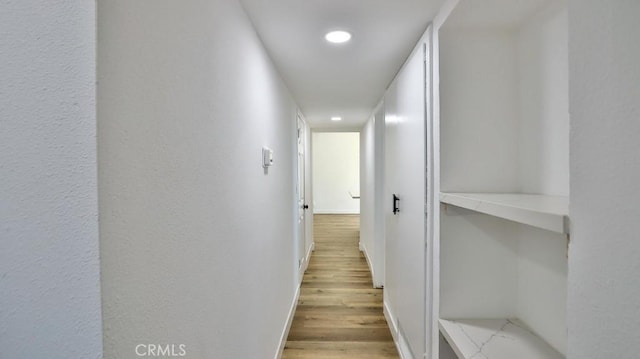 hall featuring light wood-type flooring