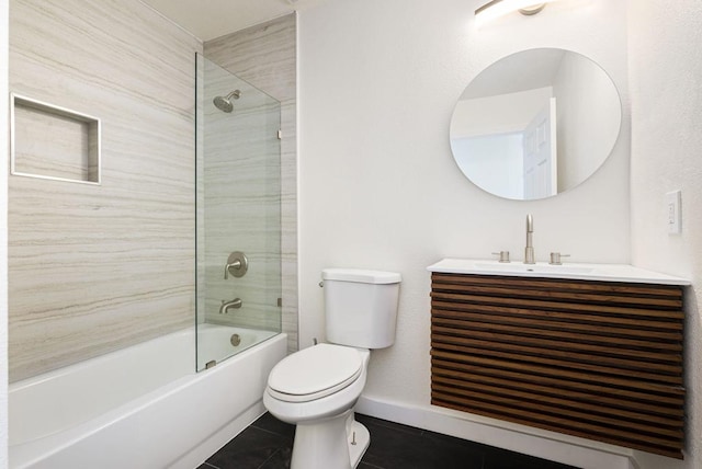 full bathroom with tiled shower / bath combo, vanity, tile patterned flooring, and toilet