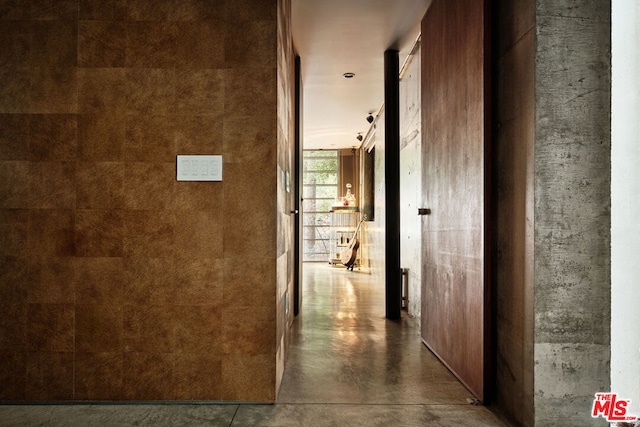 corridor featuring concrete floors