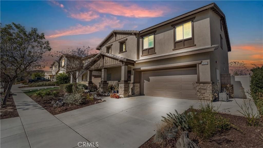 view of front of property featuring a garage