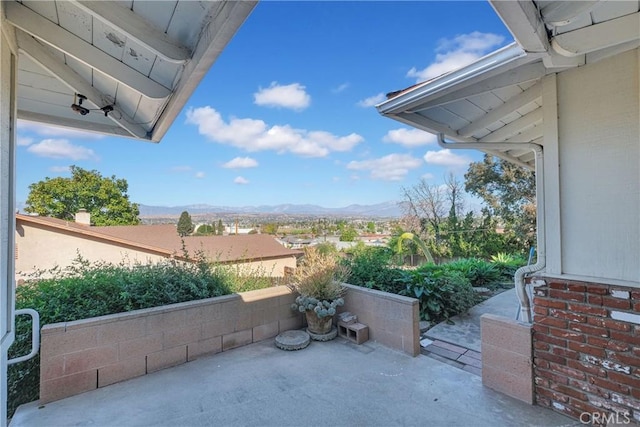 view of patio featuring a mountain view