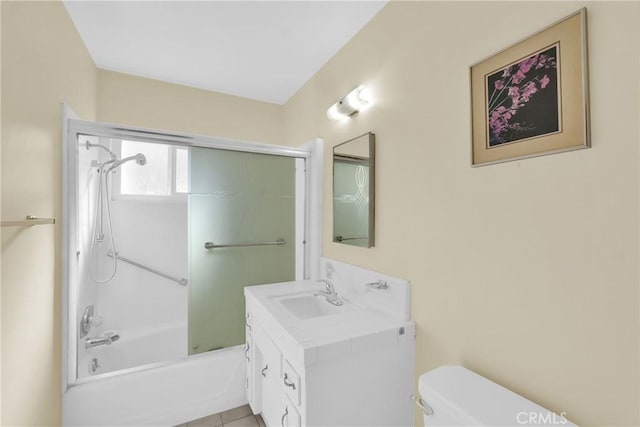 full bathroom featuring toilet, vanity, and  shower combination