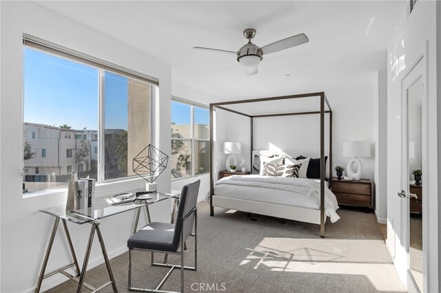 5550 Boardwalk Unit 102, Hawthorne, CA 90250 - carpeted bedroom with a ceiling fan