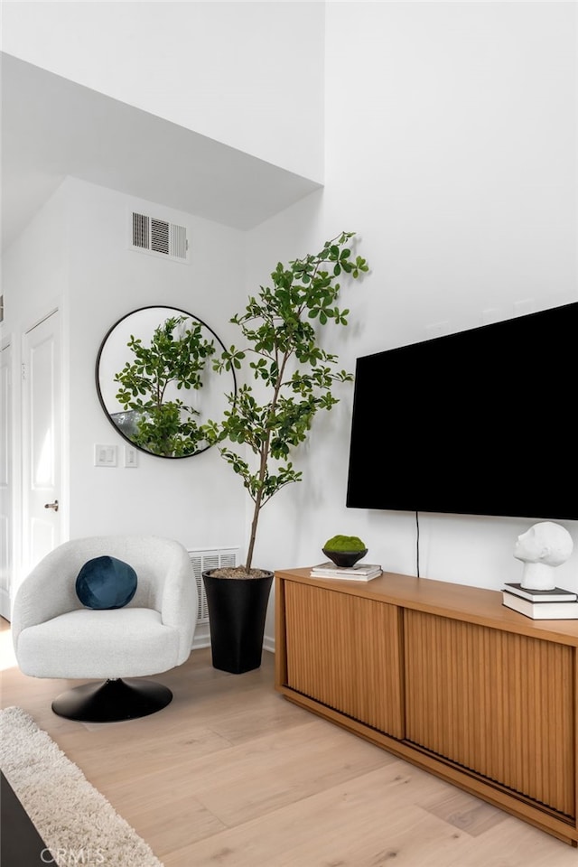 5550 Boardwalk Unit 102, Hawthorne, CA 90250 - living area featuring light wood finished floors