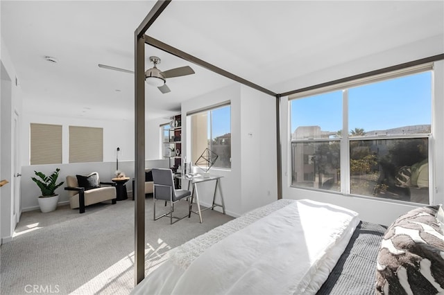 5550 Boardwalk Unit 102, Hawthorne, CA 90250 - carpeted bedroom featuring a ceiling fan and baseboards