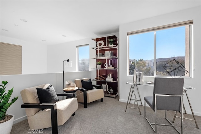 5550 Boardwalk Unit 102, Hawthorne, CA 90250 - living area featuring carpet floors and baseboards