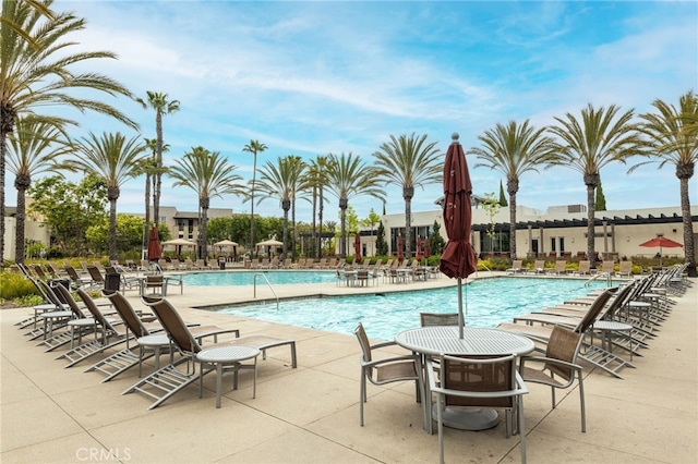 view of swimming pool featuring a patio area