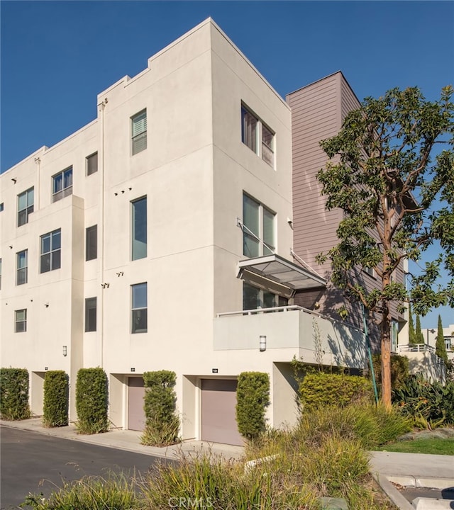 view of building exterior with a garage